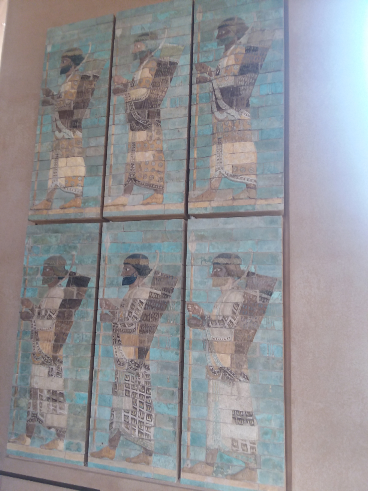 These are the Persian archers and the frieze was taken from the ruins at Susa, from the palace of Darius the Great. Islamic and pre-Islamic art of the middle east. There is a fairly large area for ancient middle eastern art. This piece is pre-Islamic. I believe it is being displayed in room 14 of the Near Eastern antiquities section of the Louvre Museum. I do not remember exactly (could also be room 11)..