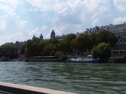 We are on the Bateaux Parisien one hour Tour up and down the Seine River from the Eiffel Tower to just past the Île Saint-Louis and then back down to the Eiffel Tower area.