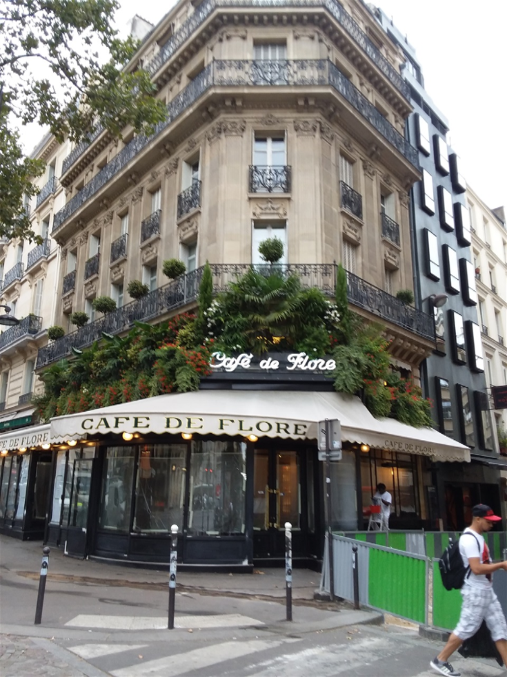 CAFE DU FLORE WAS ONE OF ERNEST HEMMINGWAYS' FAVORITE HANGOUTS.