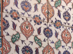This is Islamic tile art which is part of the collection in the Islamic and pre-Islamic room in the Louvre museum.