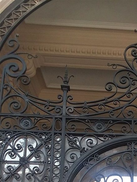 While walking from the Eiffel Tower to the Dôme des Invalides, we came across this rather large wrought iron gate and decided that it would be a good place for Farida to pose for a photo.