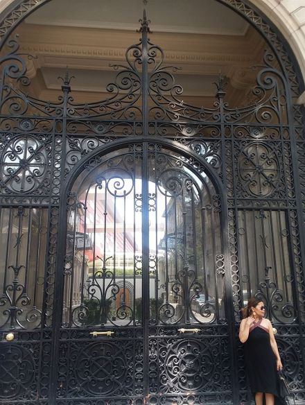 While walking from the Eiffel Tower to the Dôme des Invalides, we came across this rather large wrought iron gate and decided that it would be a good place for Farida to pose for a photo.