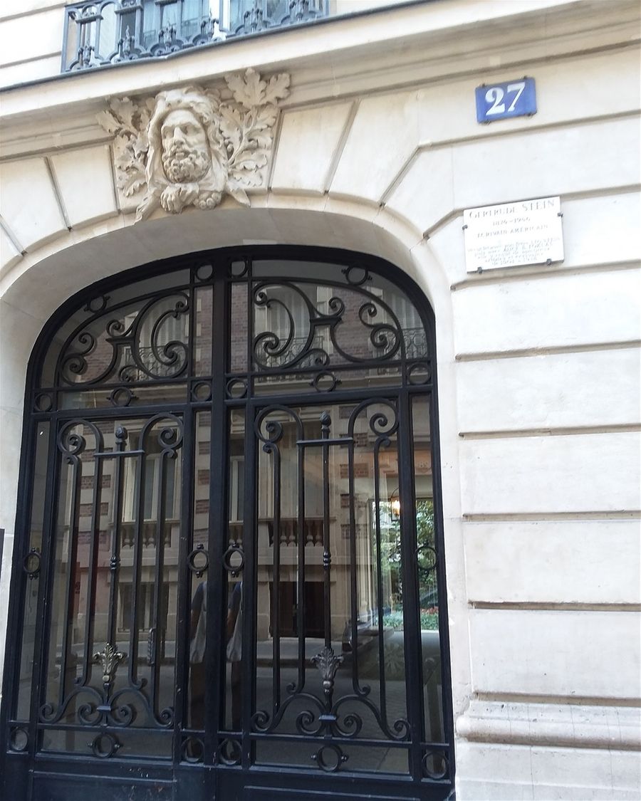 Gertrude Stein was an American expatriate novelist who lived here in Paris. She held a salon here where she entertained many aspiring artists and a few who became famous artists like Henri Matisse, Pablo Picasso, Ernest Hemingway, and F. Scott Fitzgerald. Actually, F. Scott Fitzgerald was already pretty famous during this period having already written a couple of novels. (This Side of Paradise and The  Beautiful and the Damned). He was also writing The Great Gatsby which he finished around 1925.