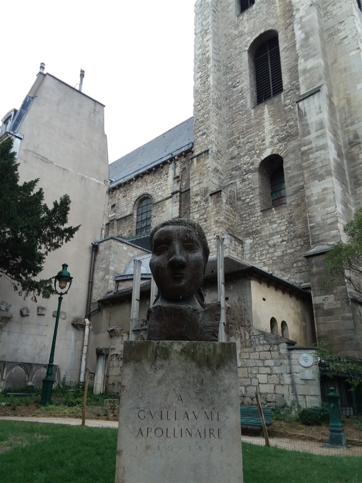 OUTSIDE OF SAINT-GERMAIN DES PRÉS THE BUST WAS DONE BY PABLO PICASSO.