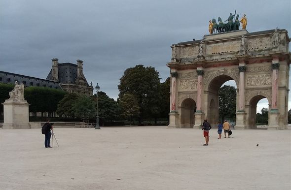 Arch de Carrousel, North end of Grand Gallerie of the Louvre, and with Jardine Tuileries beyond.