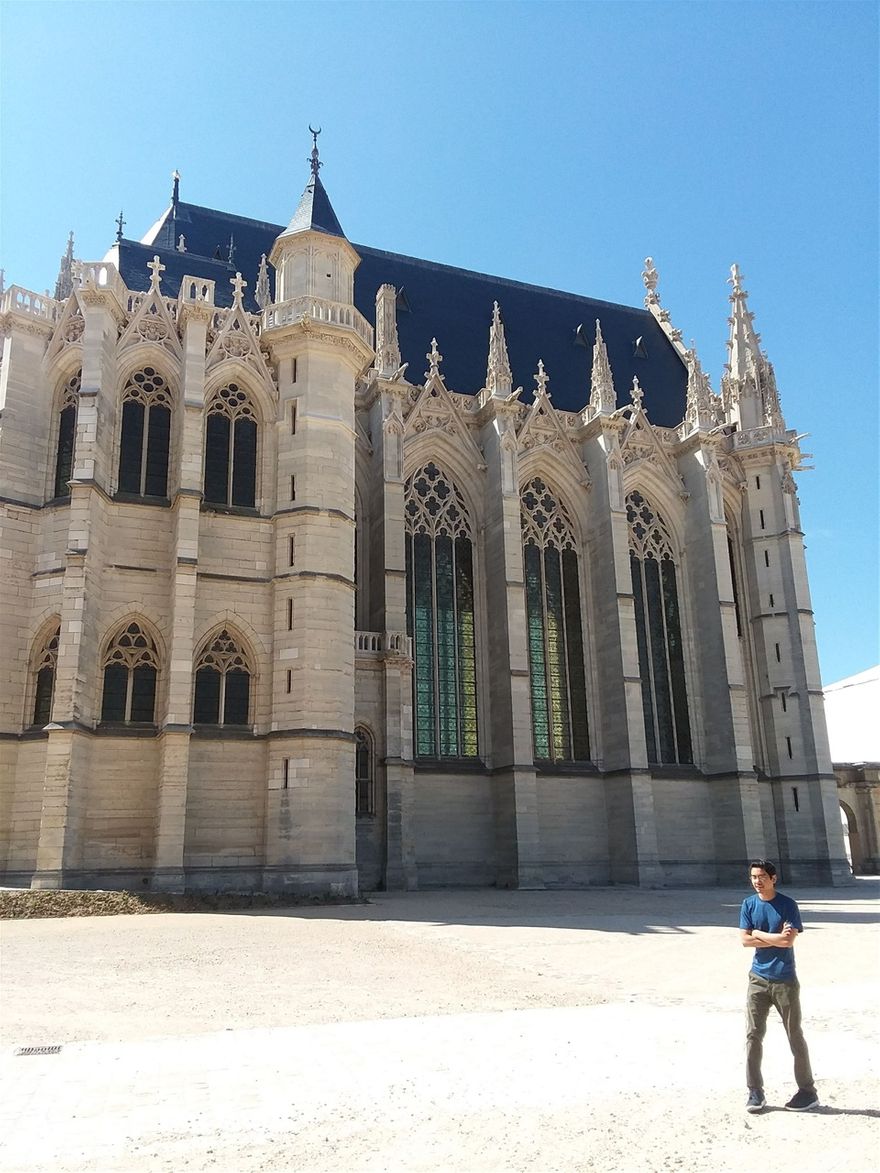 Taking a photo with Reno. The Royal Chapel is behind him. This is the only building that requires an extra entrance fee at Château de Vincennes and the fee is very small. We did not hesitate to get the tickets and we are quite miserly.
