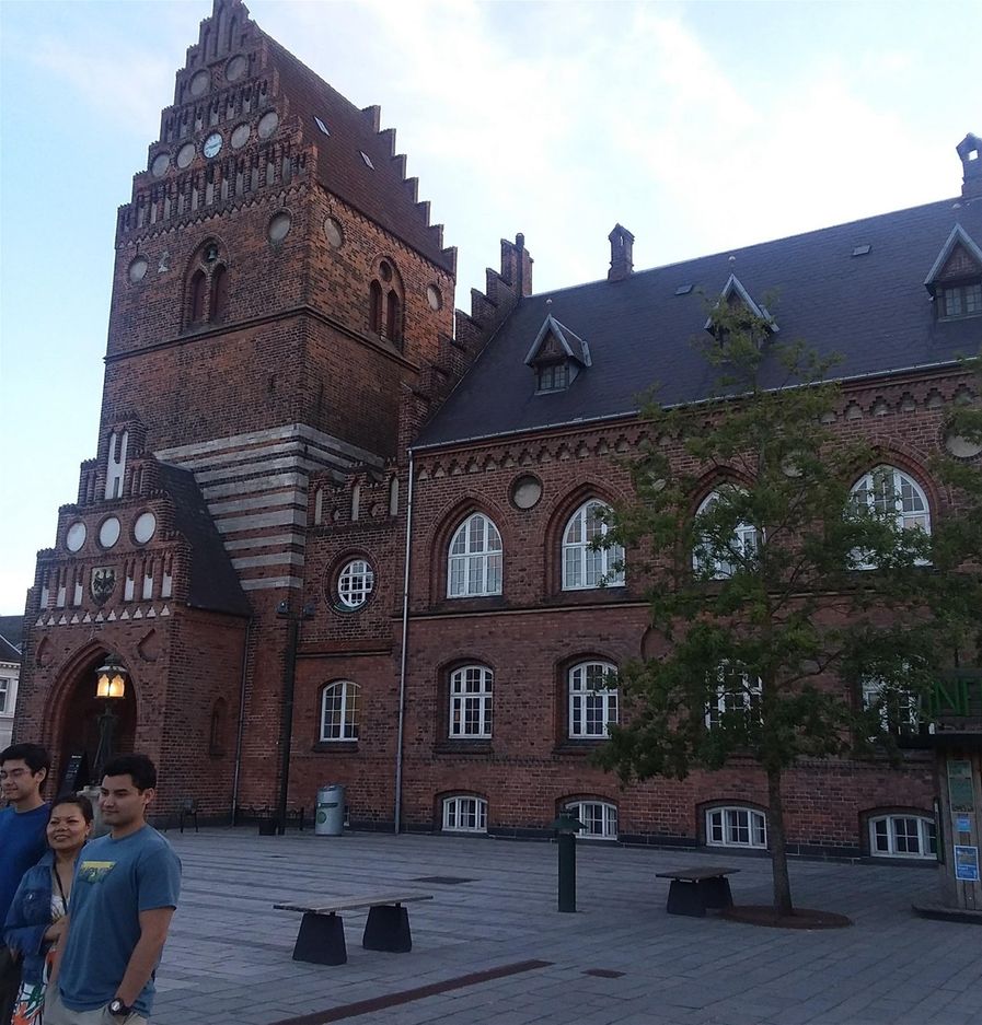We are in the area of Rosgilde Cathedral and the Royal Mansion in Roskilde Danmark. This particular building was the City Hall in medieval times. There is now a Skt.  Laurentius History Museum here. getting ready to walk from here to the Viking Museum which is not far at all.