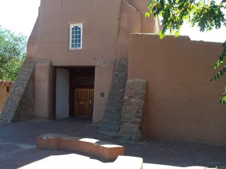 San Miguel Mission Church in Santa Fe NM. One of the oldest churches in USA. It is a National Historical Building built around 1615 in the Romanesque Fortress architectural style.