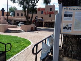 A second view of Old Town Plaza Taos with the veterans memorial on the left.