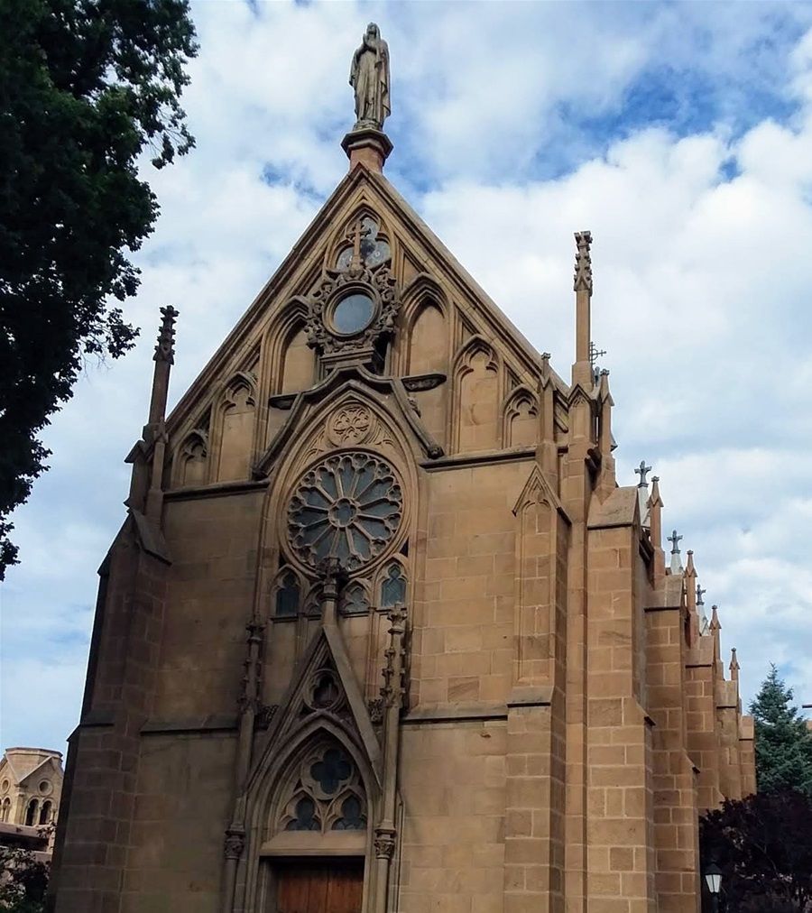 This is Loretto Chapel at 207 Old Santa Fe Trail, Santa Fe New Mexico. Construction began in 1873. The six sisters of Loretto, who were sent to Santa Fe to start up a school for girls had commissioned the construction. There is a 