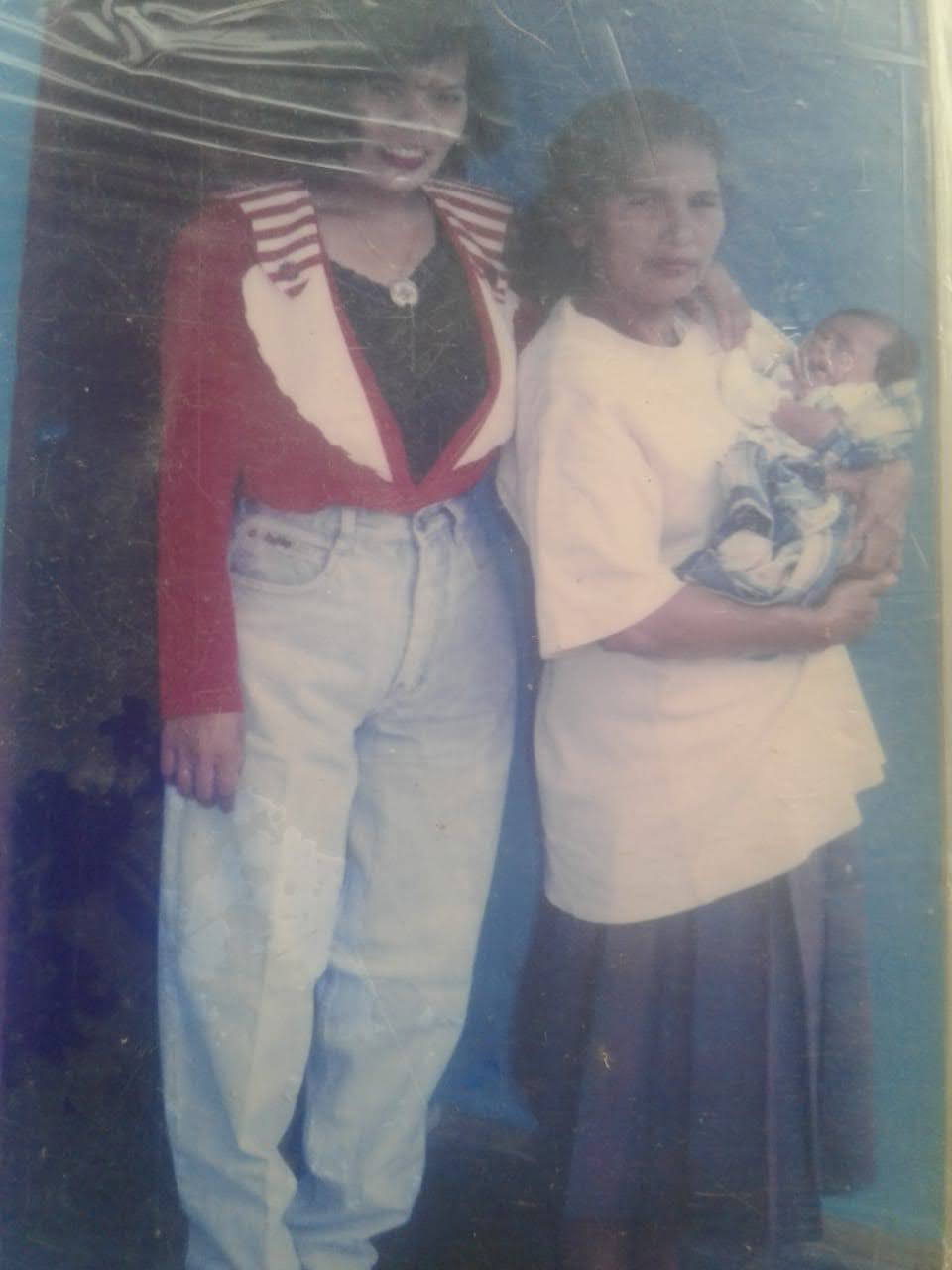 FARIDA & HER MOM HOLDING RAYHEND, OUR FIRST SON AT THEIR HOME