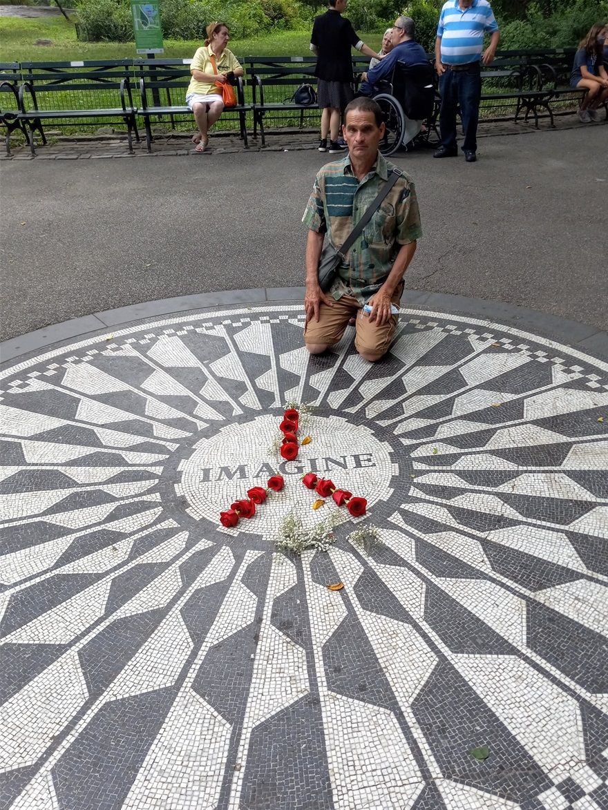 We are at the John Lennon Memorial in Central Park. I post this photo as Russia is invading Ukraine. John Lennon wrote in his song 