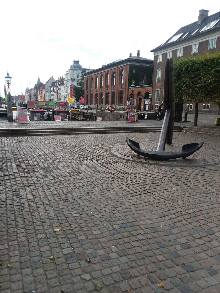 The Mindeankeret is at Nyhavn Canal in Copenhagen. The Mindeankeret is a Memorial Anchor. It commemorates the civilian sailors who died at sea during WWII. Underneath the anchor is a lead capsule which contains the names of 1,600 sailors.