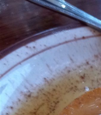 Many New Mexican restaurants will also serve Flan because it is very traditional to Latin American cuisine. It is a custard made with milk, egg, and some kind of sweetener. The sauce on top is a caramel sauce. The milk is usually a condensed milk that may already have the sweetener in it. Cinnamon is also usually sprinkled on it. As you can see here, there is Cinnamon sprinkled all over the flan and the plate.  .