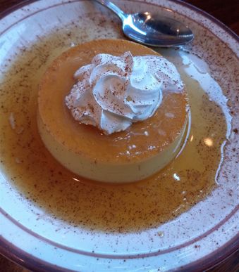 Many New Mexican restaurants will also serve Flan because it is very traditional to Latin American cuisine. It is a custard made with milk, egg, and some kind of sweetener. The sauce on top is a caramel sauce. The milk is usually a condensed milk that may already have the sweetener in it. Cinnamon is also usually sprinkled on it. As you can see here, there is Cinnamon sprinkled all over the flan and the plate.  .