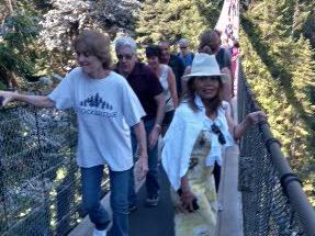 This is called the Capilano Suspension Bridge because it crosses the Capilano River which is 230 feet (70 meters below). It is 460 feet (140 meters) long and has existed here since 1889. As you can see, this is a popular attraction, with something like 1.2 million visitors every year.